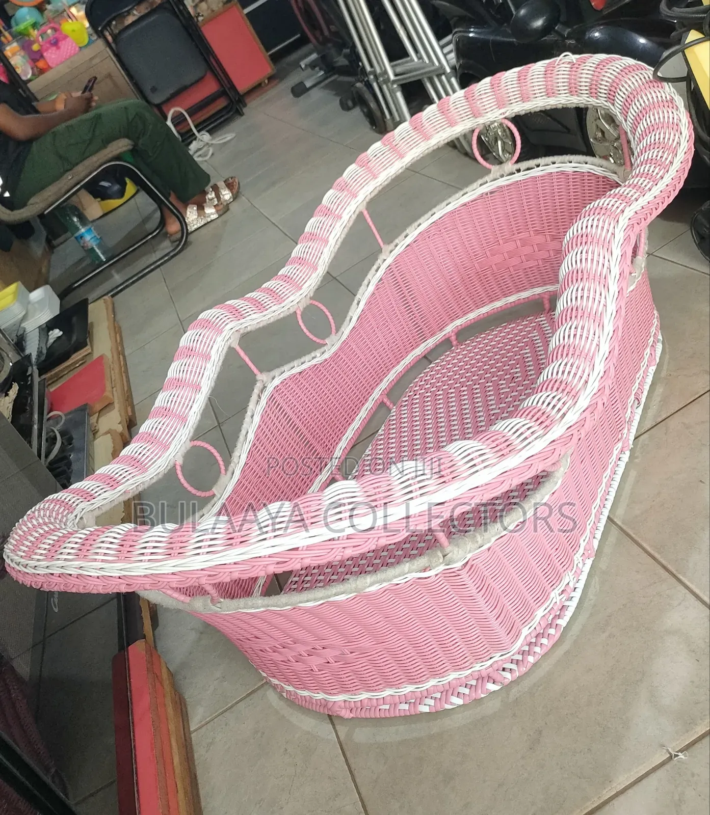 UK Used Pink and White Woven Wicker Baby Bassinet.