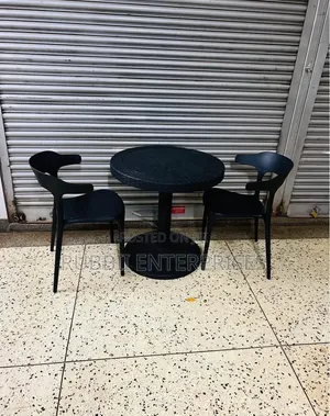 1 Round Table + 2 Minimalist Curved-Back Chair