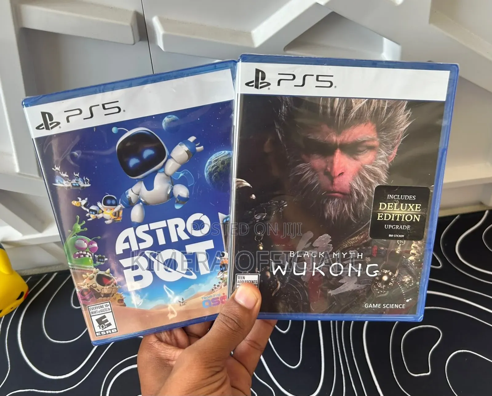 Astro Bot and Wukong. Game CDs for PS5