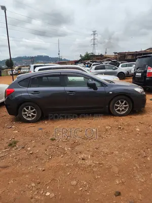 Subaru Impreza 2.0i Premium PZEV 4dr Hatchback AWD (2.0L 4cyl 5M) 2014