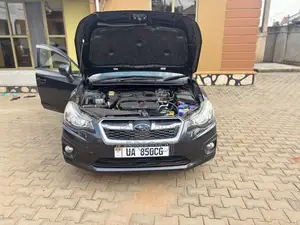 Subaru Impreza 2.0i Premium PZEV 4dr Hatchback AWD (2.0L 4cyl 5M) 2014