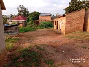 Plot With Unfinished House for Sale in Nalongo