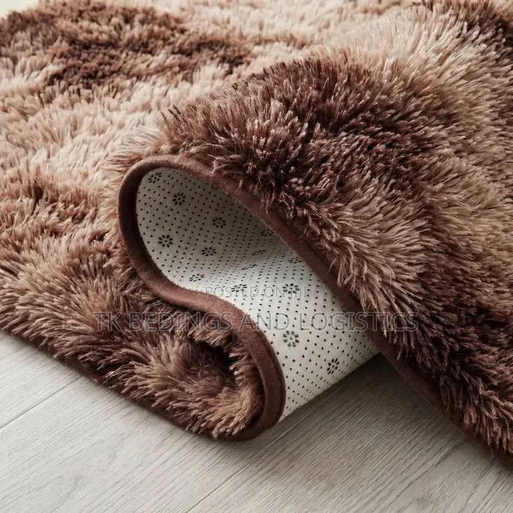 Patched Brown Centre Carpet