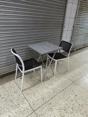 Foldable Table and 2plastic Chairs Foldable Table and 2plastic Chairs