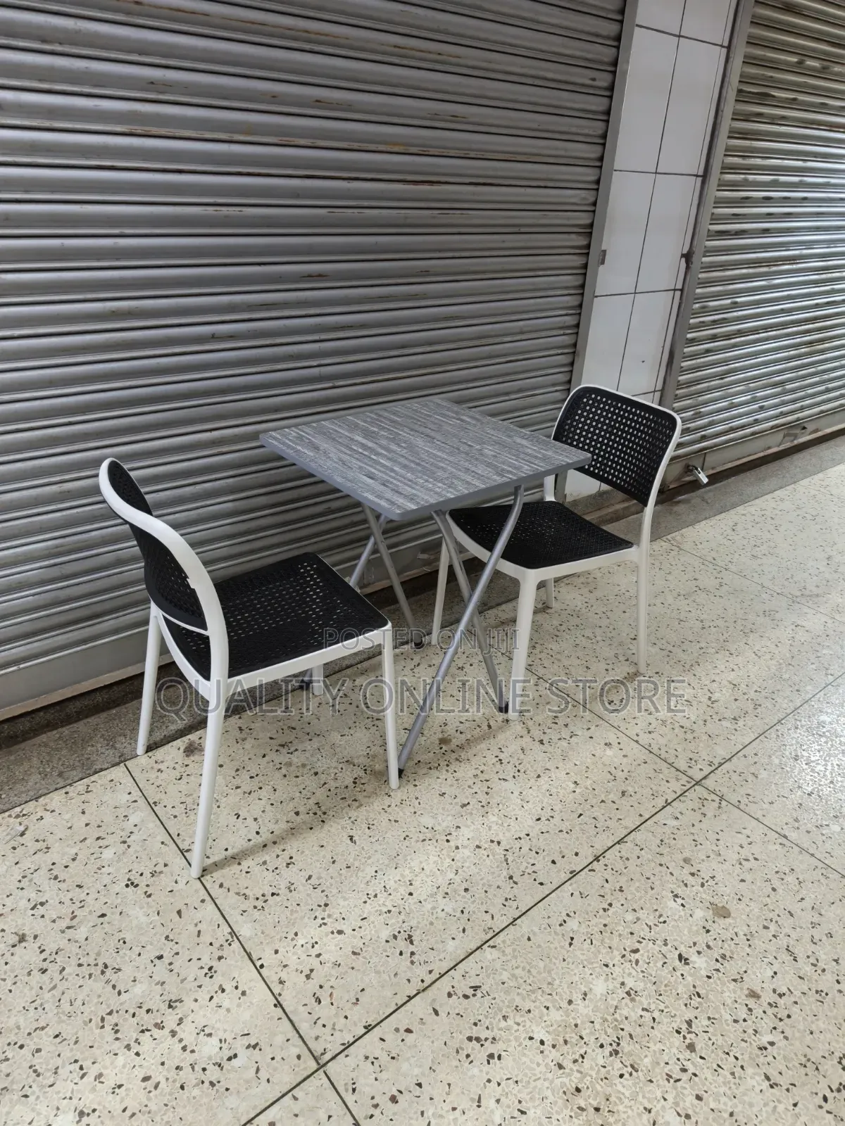Foldable Table and 2plastic Chairs Foldable Table and 2plastic Chairs
