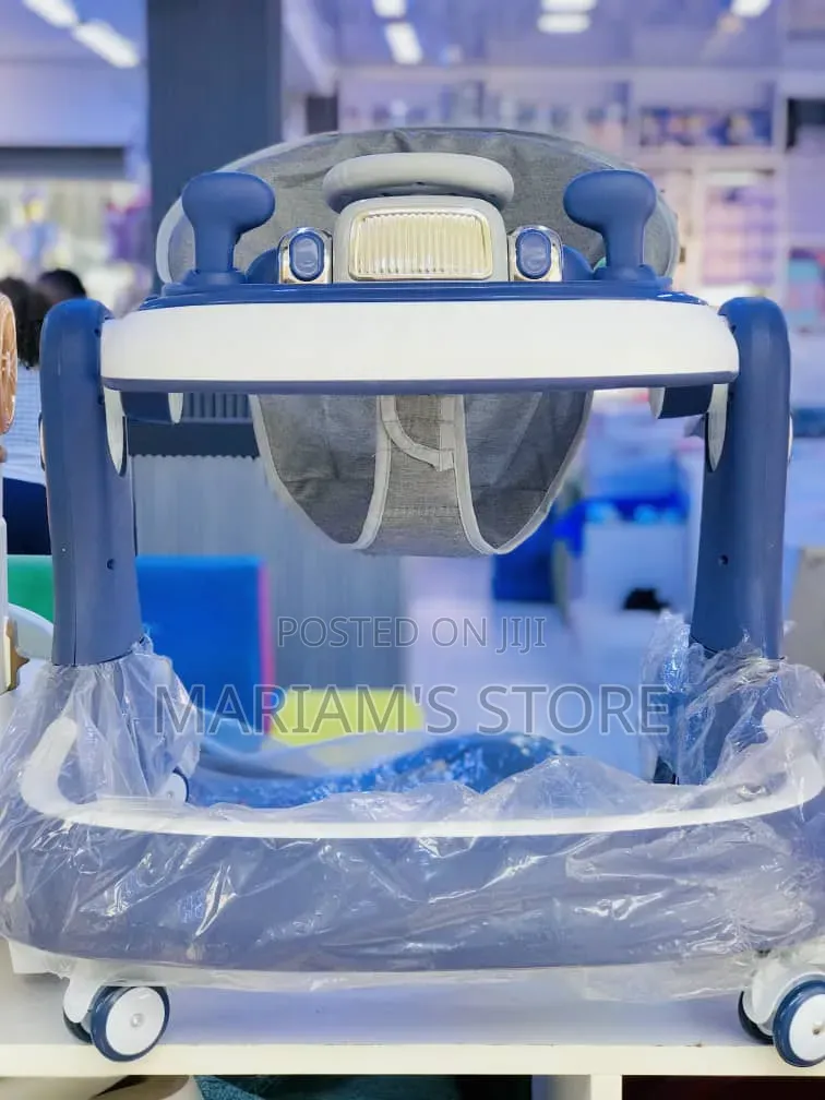 Multi-Functional Adjustable Baby Walker With a Fabric Support Seat