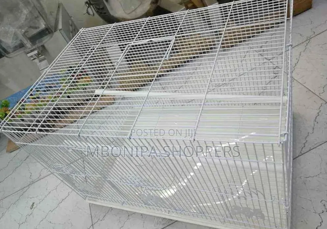 White Rectangular Bird Cage Typically Used for Birds