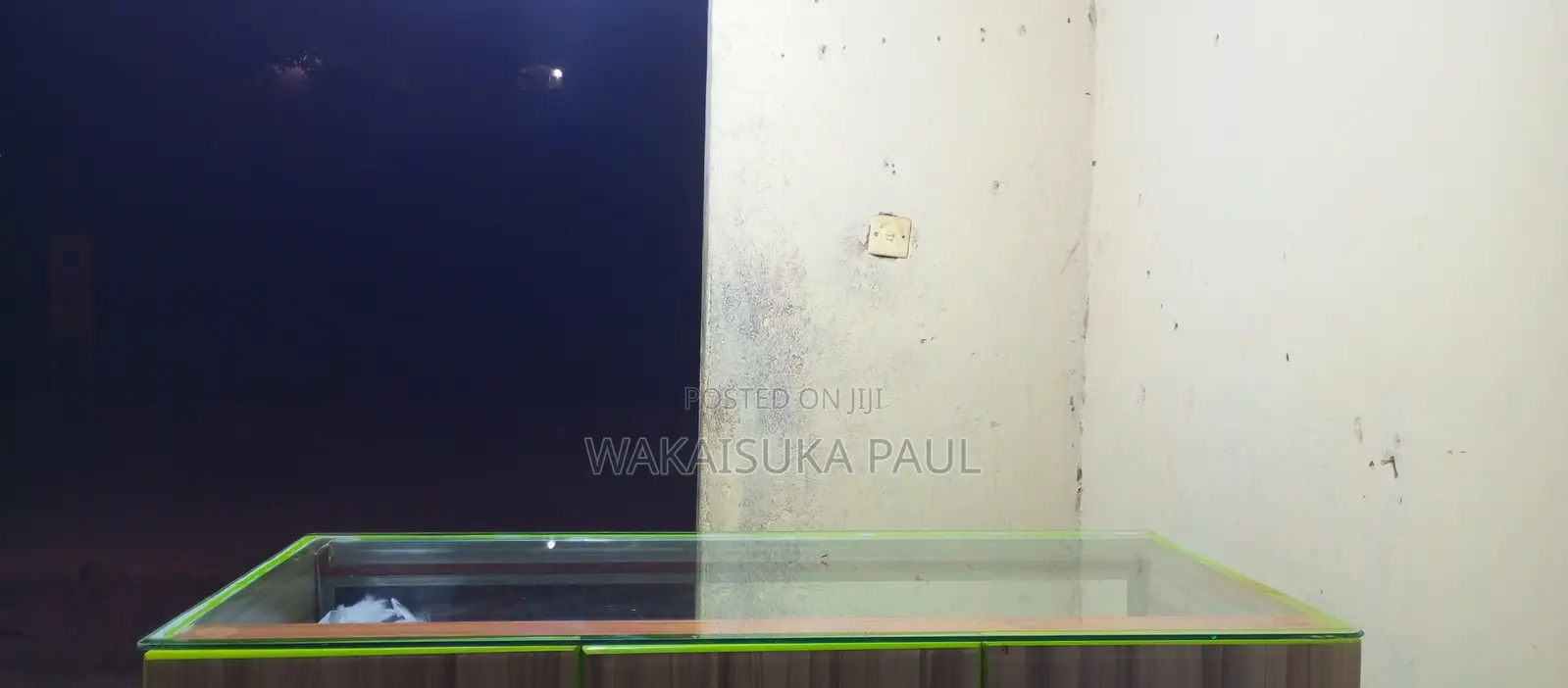 Counter With Top Glass and Made of Boards