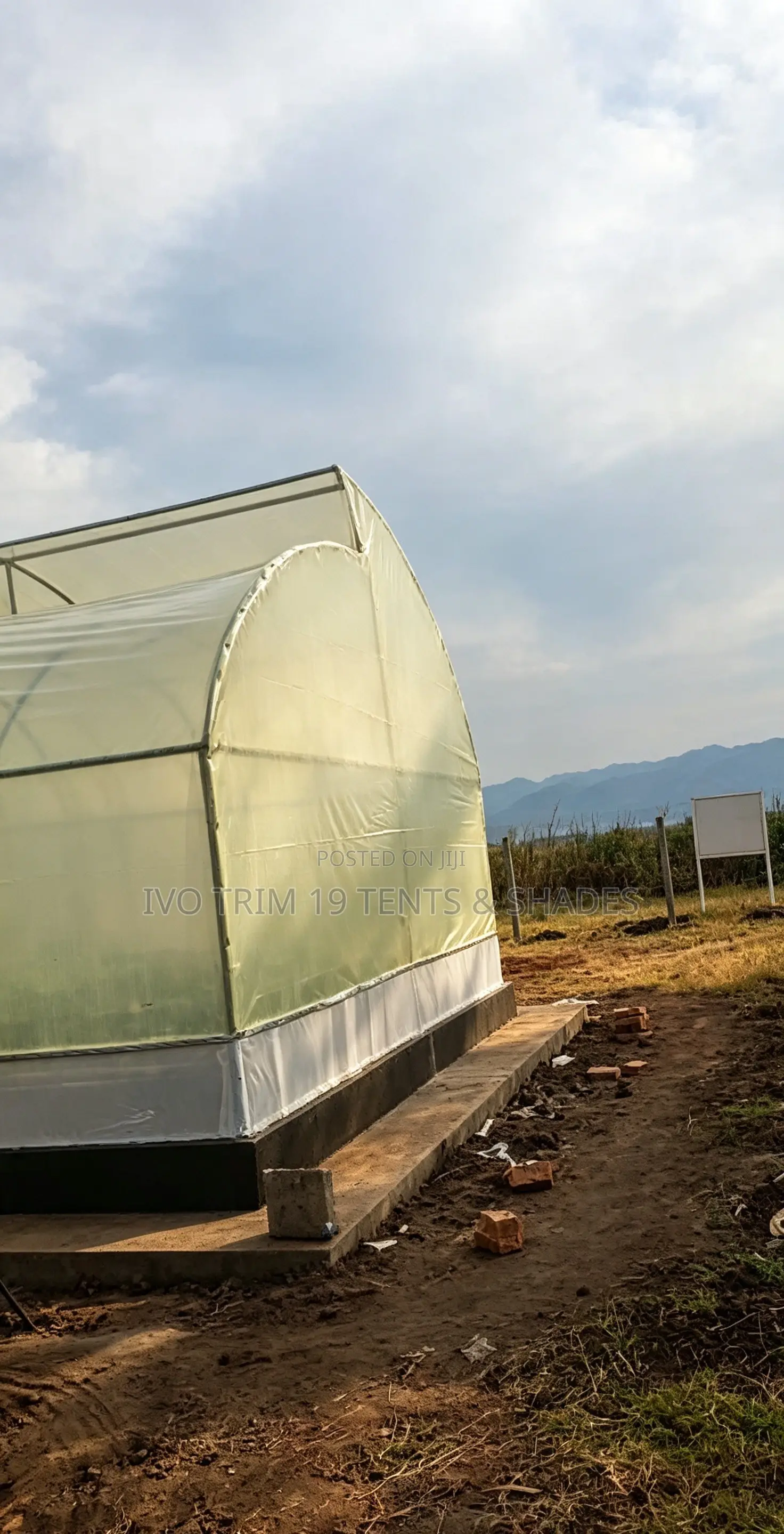 Front-Entry Tropical Sawtooth Greenhouse