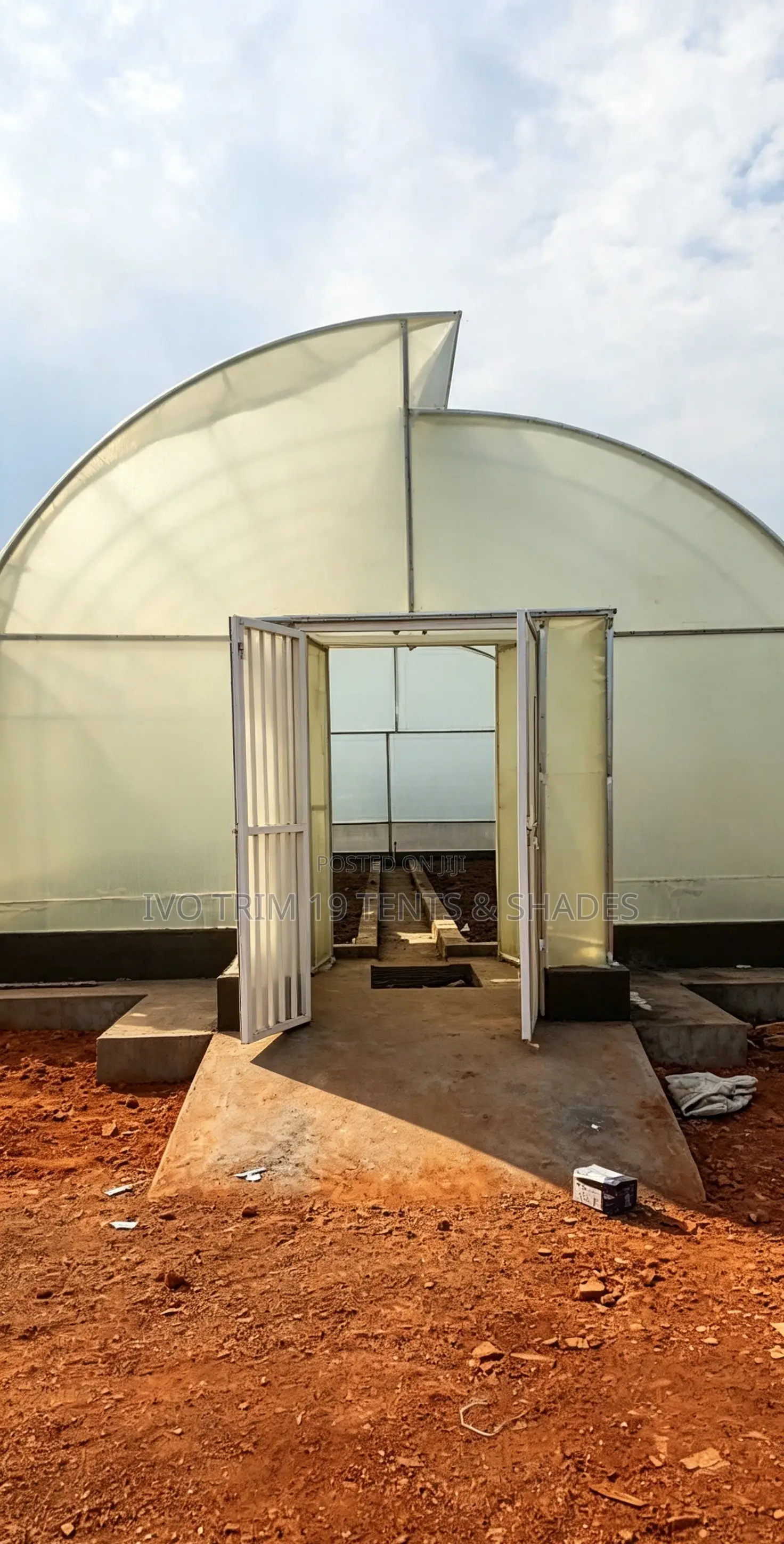 Front-Entry Tropical Sawtooth Greenhouse