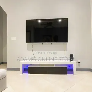 White and Black TV Stand Unit With Led Lights
