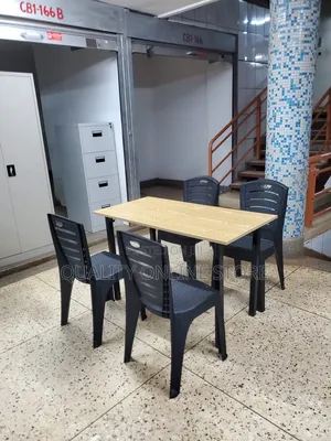 Dining Wooden Table and Plastic Chairs