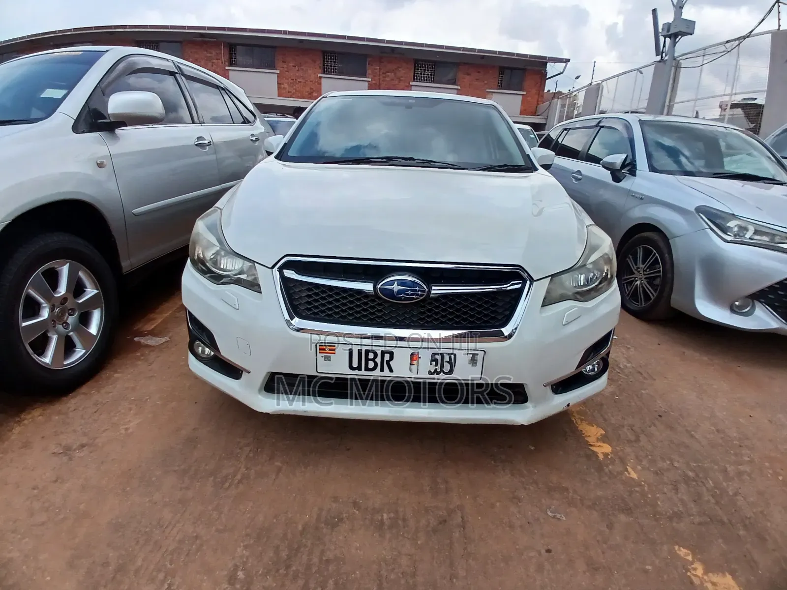 Subaru Impreza 2.0i Limited PZEV 4dr Hatchback AWD (2.0L 4cyl CVT) 2015 White
