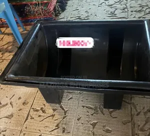 Heavy-Duty Black Plastic Utility or Livestock Feeding Trough