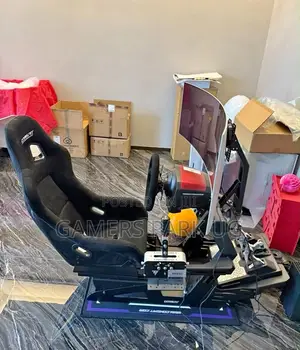 Raching Wheel With Its Gaming Chair and All the Accessories