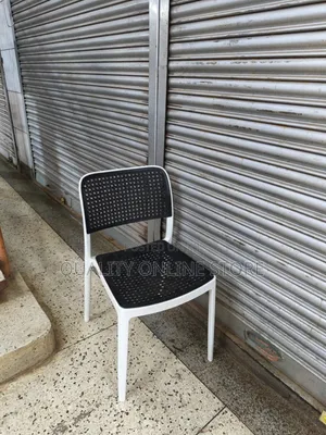 Stackable Whitic and Black Plastic Chairs Plastic Chairs