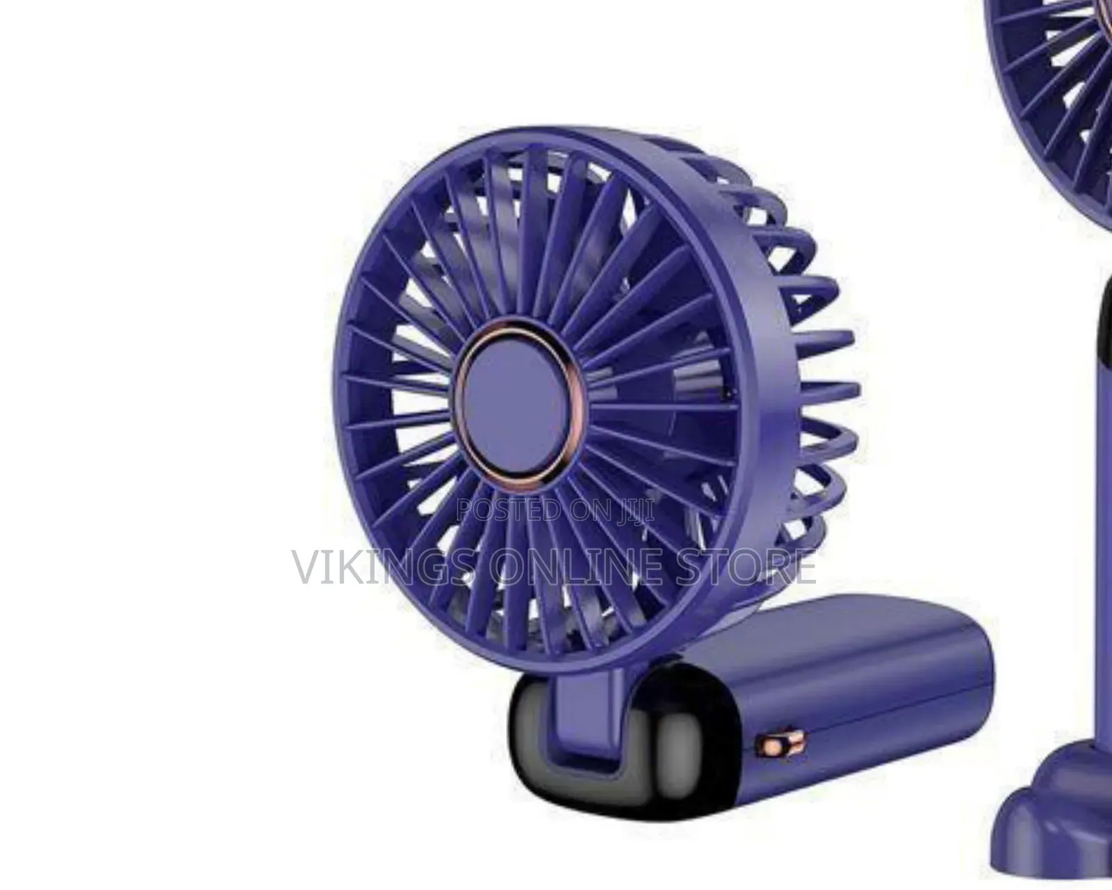 A Purple Foldable Mini Handheld Fan Featuring a Digital Display