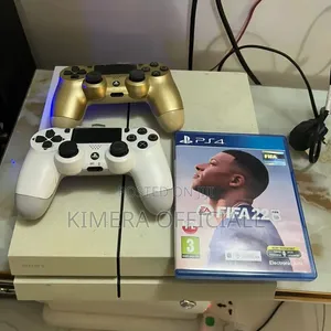 Sony Playstation 4 Standard With FC27 FIFA 27, 2 Pads & 13 More Games