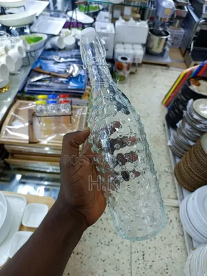 Textured Glass Beverage Bottle With a Swing-Top (Flip-Top) Closure.