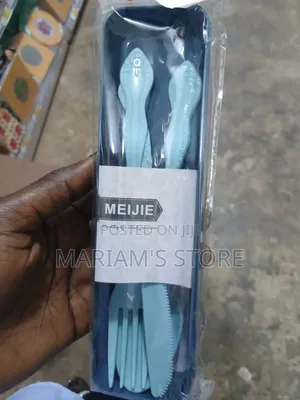 Plastic Travel Cutlery Set Features a Light Blue Spoon, Fork, A