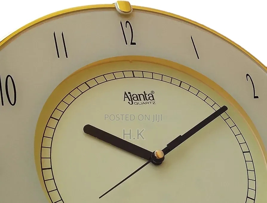 Ajanta Plastic Glass Wall Clock (25 X 25 Cm, Ivory)