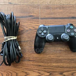 Sony Ps4 Pro With 32 Games and 2 Pads the Ultimate Home Entertainment