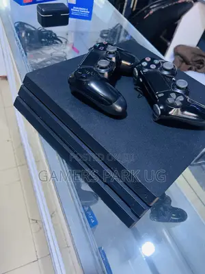 PS4 Pro Console With 20 Games and 2 Controllers With Accessories