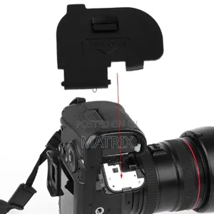 Replacement Battery Door Cover for a Canon DSLR Camera.