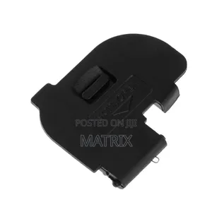 Replacement Battery Door Cover for a Canon DSLR Camera.
