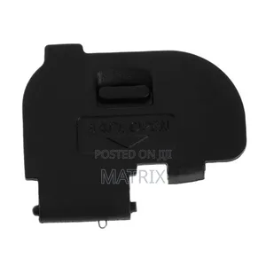 Replacement Battery Door Cover for a Canon DSLR Camera.