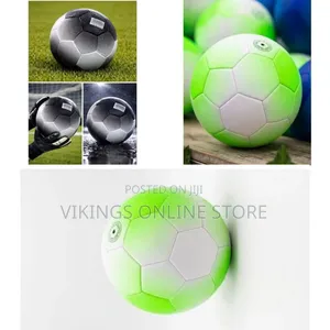 A Bright Neon Green and White Gradient Soccer Ball With a Traditional