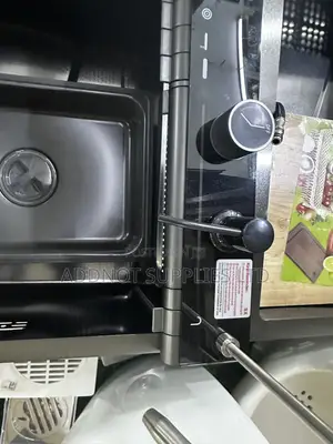A Multifunctional Nano-Black Smart Kitchen Sink With a Digital Display