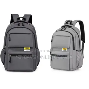 Multi-Compartment Casual Daypack and Laptop School Backpack.