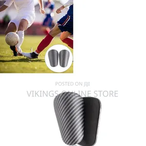 Lightweight Mini Soccer Shin Guards for a Distinct Carbon Fiber Weave