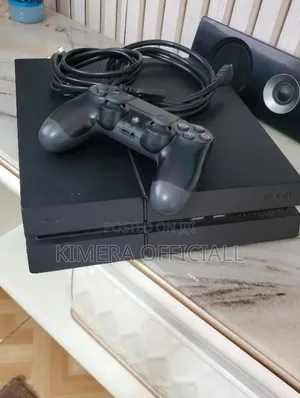 PS4 Standard. Kampala's Best Price. Chipped With 12 Games and 2 Pads