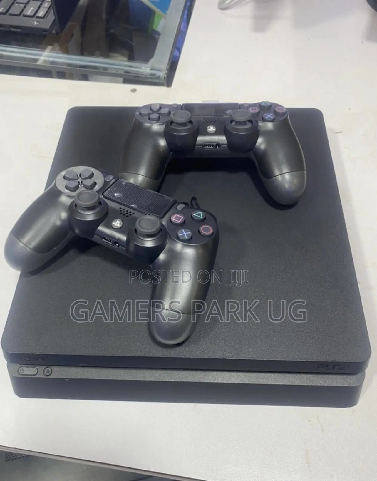 Ps4 Slim With 2 Original Controllers and 8 Games