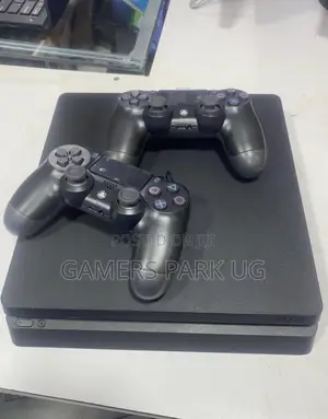 Ps4 Slim With 2 Original Controllers and 8 Games