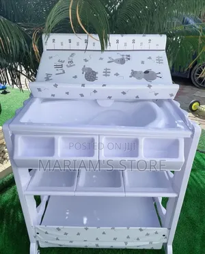 Multi-Functional Baby Bath and Changing Station With Concealed Bathtub