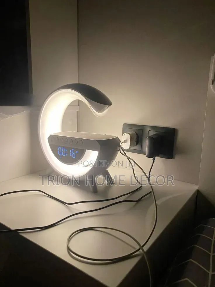 4-in-1 Multifunctional LED Wireless Charging Speaker.