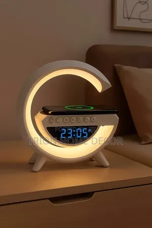 4-in-1 Multifunctional LED Wireless Charging Speaker.