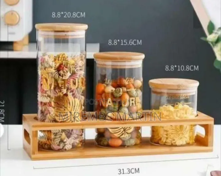 Cylindrical Glass Canister Set With Wooden Lids and Display Rack