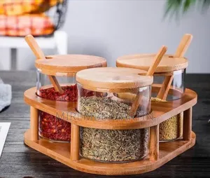 3-Piece Rotating Condiment Set With Clear Jars and Wooden Accessories