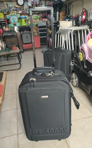 Japanese Joy Carry Black Fabric Medium Size Rolling Suitcase.
