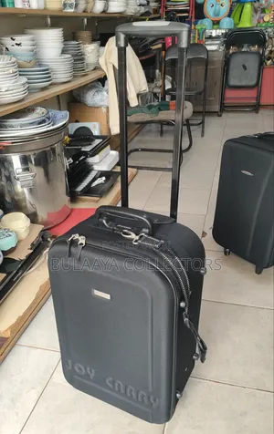 Japanese Joy Carry Black Fabric Medium Size Rolling Suitcase.