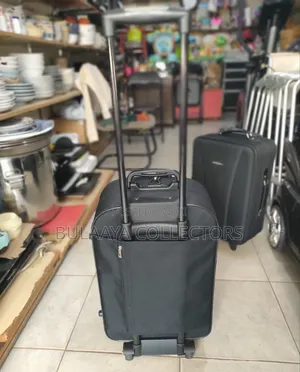 Japanese Joy Carry Black Fabric Medium Size Rolling Suitcase.