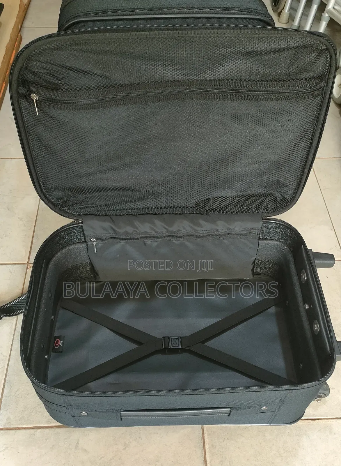 Japanese Joy Carry Black Fabric Medium Size Rolling Suitcase.
