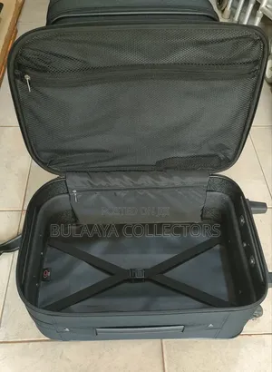 Japanese Joy Carry Black Fabric Medium Size Rolling Suitcase.
