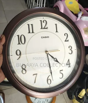 Japanese Casio Dark Metallic Brown Analog Wall Clock, Model IQ-60-5D.