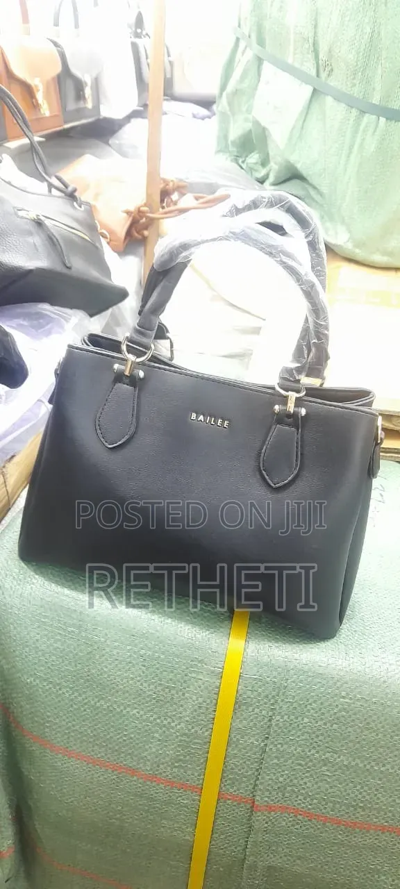Three-Zipped Handbag and Matching Wallet Set