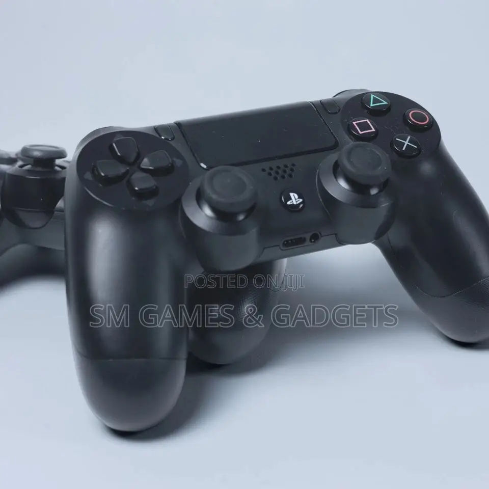 Chipped PS4 Pro (1TB) + 2 Controllers + 20 Games + 6 Months Warranty!